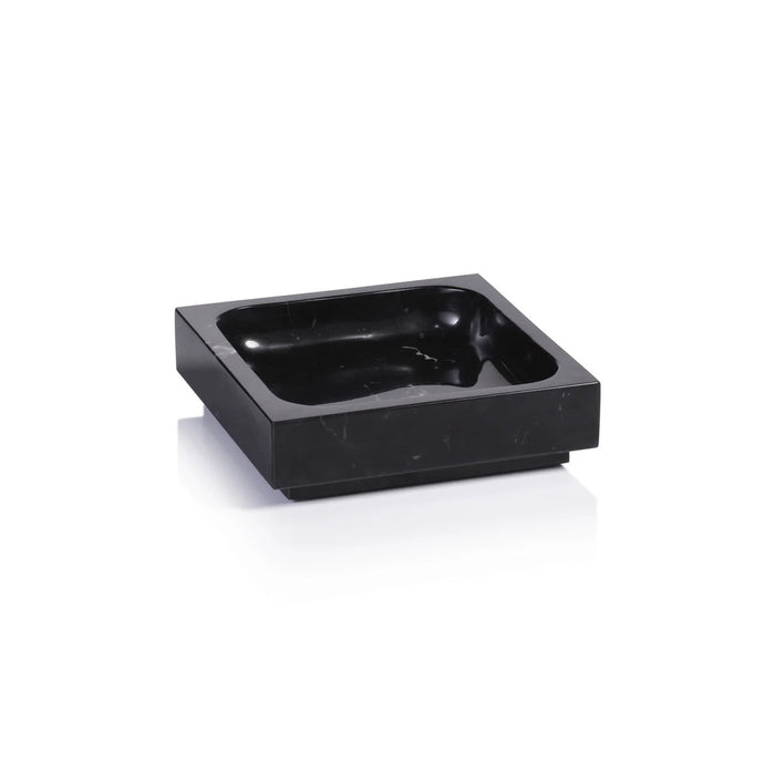 The ZODAX NERO MARQUINA NATURAL MARBLE TRAY - SMALL features a square shape, black marble with a smooth, glossy finish and rounded inner corners, highlighting its high-quality material and minimalist design against a plain white background.