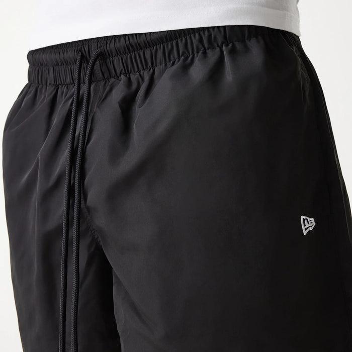 The Male model is wearing New Era Black Swim Shorts 7