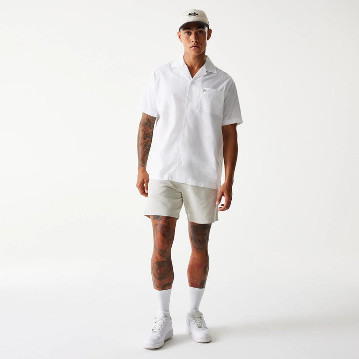 The Male model is wearing New Era Cream Chino Shorts 8