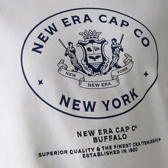 The Male model is wearing New Era Crest White Oversized T-Shirt 5
