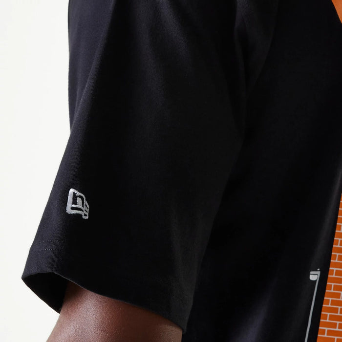 The Male model is wearing New Era Graffiti Graphic Black Oversized T-Shirt 8