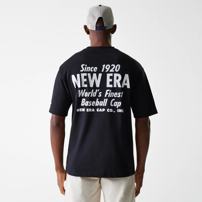 The Male model is wearing New Era Graphic Black Oversized T-Shirt 2