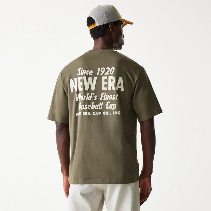 The Male model is wearing New Era Graphic Green Oversized T-Shirt 2