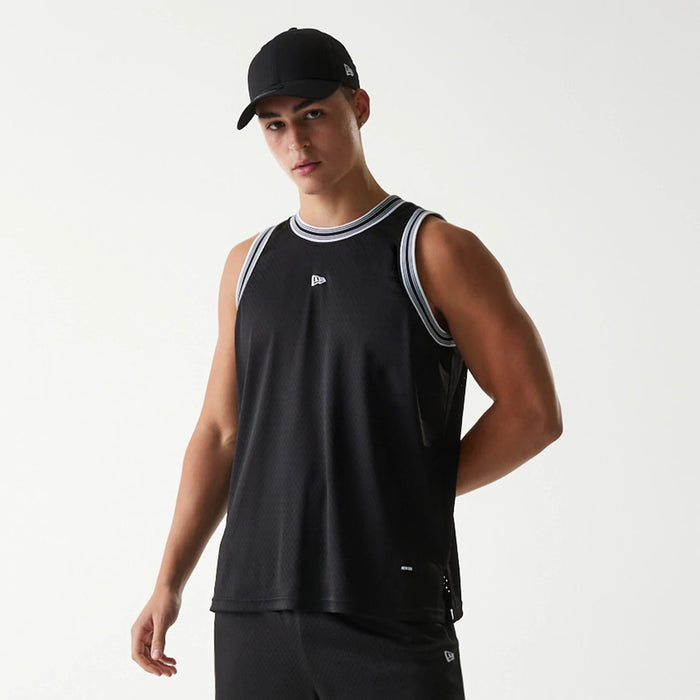 The Male model is wearing New Era Japan Mesh Black Sleeveless T-Shirt 5