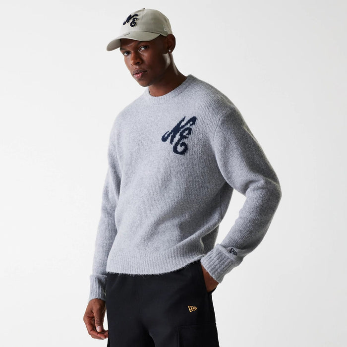 The Male model is wearing New Era Knit Grey Oversized Knit Sweater 3