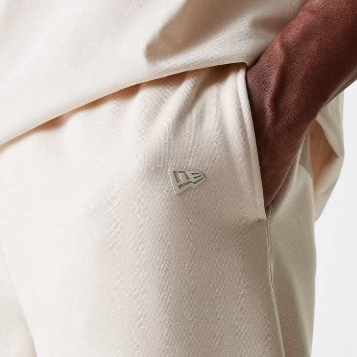 The Male model is wearing New Era Light Beige Straight Leg Joggers 6
