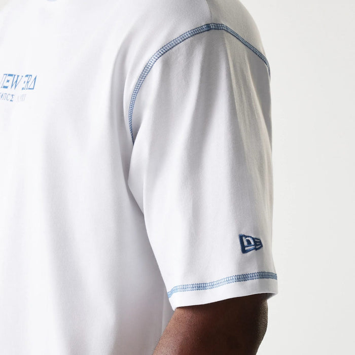 The Male model is wearing New Era Orthodox Church White Oversized T-Shirt 6