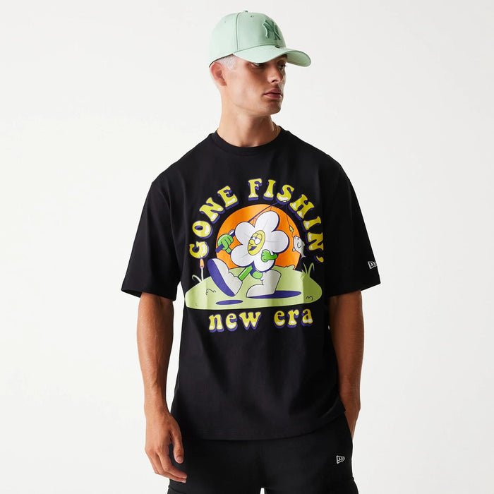 The Male model is wearing New Era Outdoor Graphic Black Oversized T-Shirt 3