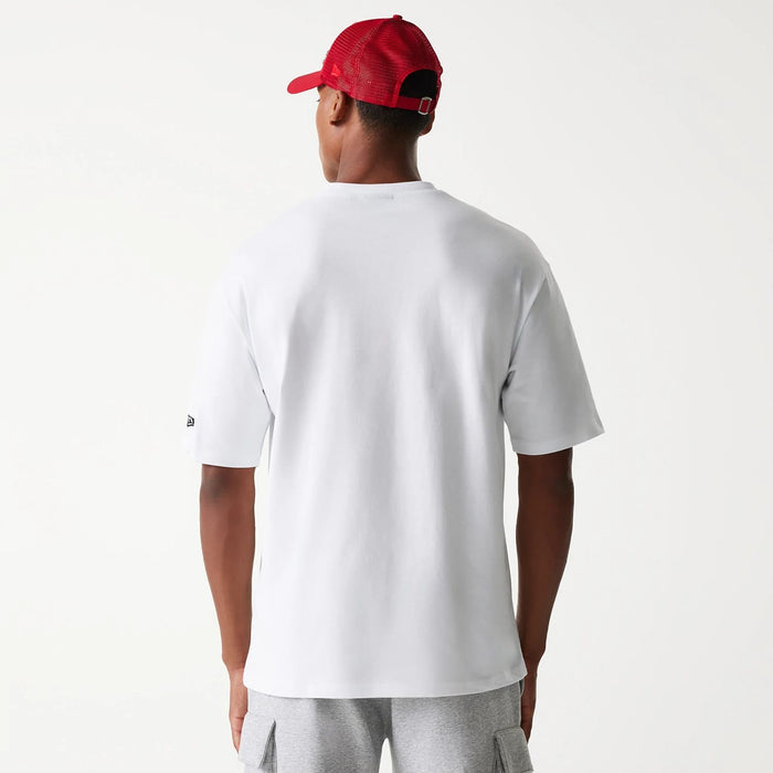 The Male model is wearing New Era Outdoor Graphic White Oversized T-Shirt 2