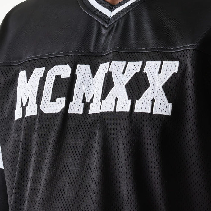 The Male model is wearing New Era Retro Sports Black Mesh Jersey 5