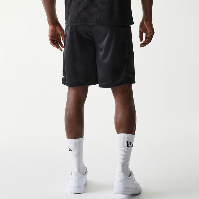 The Male model is wearing New Era Retro Sports Black Mesh Shorts 2