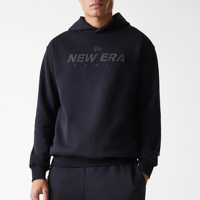 The Male model is wearing New Era Tech Black Oversized Pullover Hoodie 5