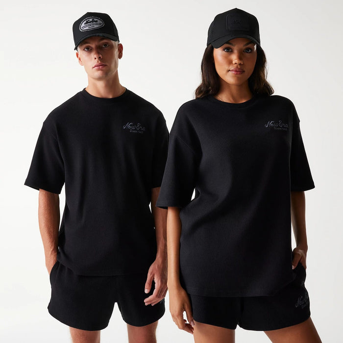 The Male model is wearing New Era Waffle Black Oversized T-Shirt 1