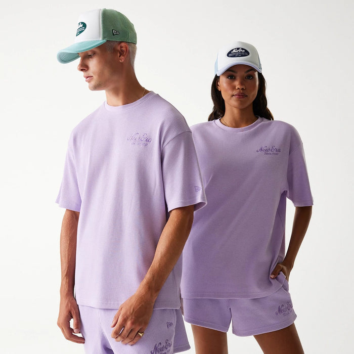The Male model is wearing New Era Waffle Pastel Purple Oversized T-Shirt 1