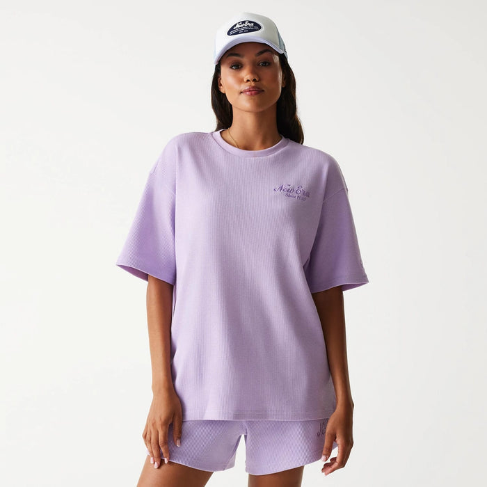 The Male model is wearing New Era Waffle Pastel Purple Oversized T-Shirt 4