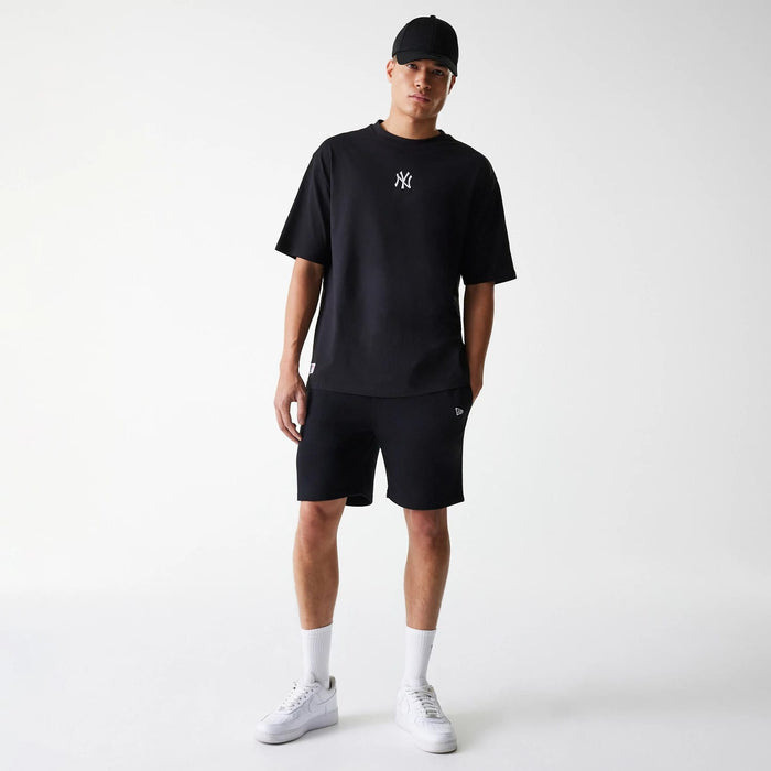 The Male model is wearing New York Yankees MLB League Essential Black Oversized T-Shirt 8