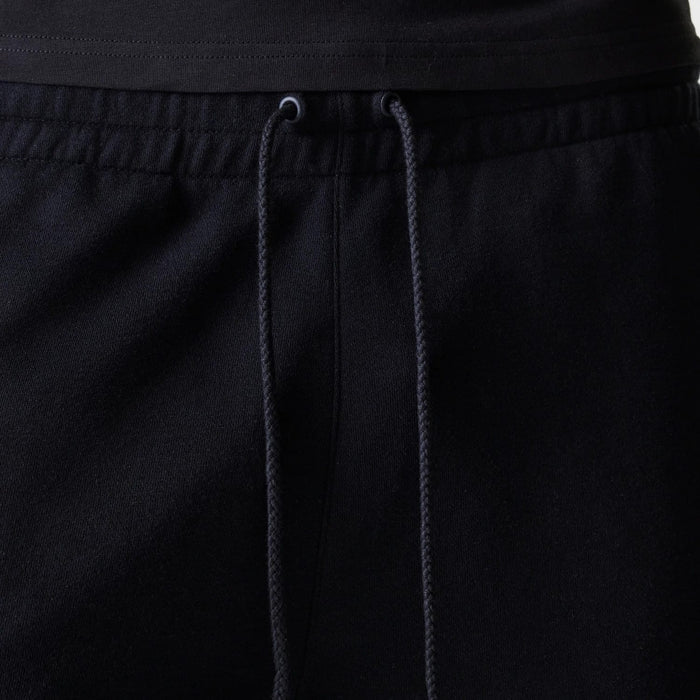 The Male model is wearing New York Yankees MLB League Essential Black Shorts 6
