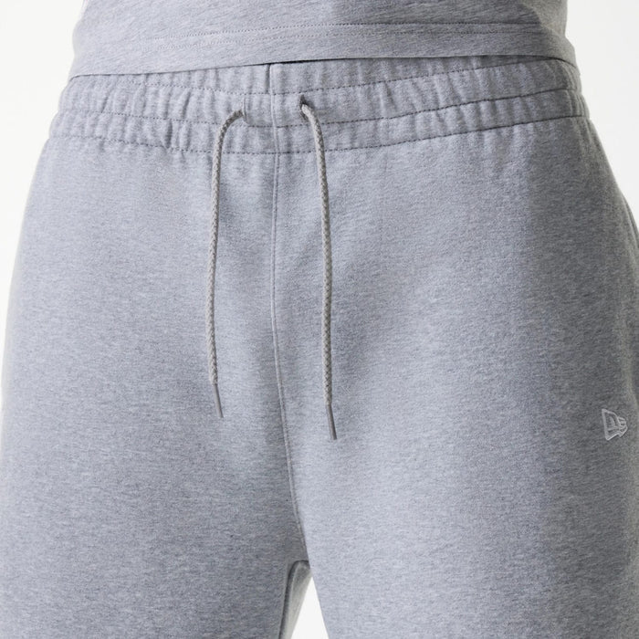 The Male model is wearing New York Yankees MLB League Essential Grey Shorts 6