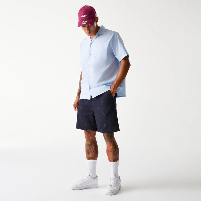 The Male model is wearing New York Yankees MLB Monogram Navy Shorts 8