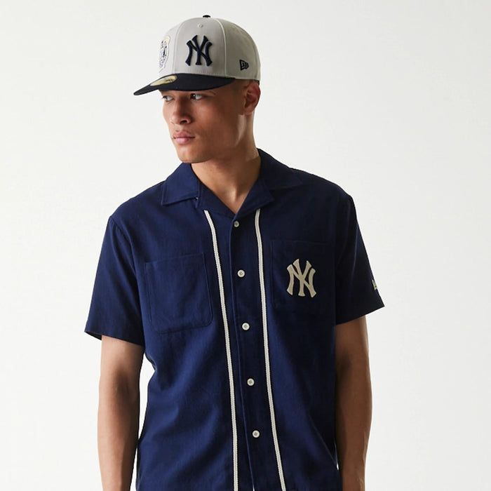 The Male model is wearing New York Yankees MLB Piping Navy Short Sleeve Shirt 3
