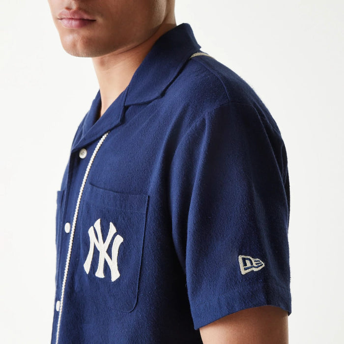 The Male model is wearing New York Yankees MLB Piping Navy Short Sleeve Shirt 4