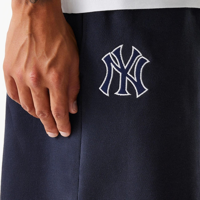 The Male model is wearing New York Yankees MLB Pique Navy Shorts 8