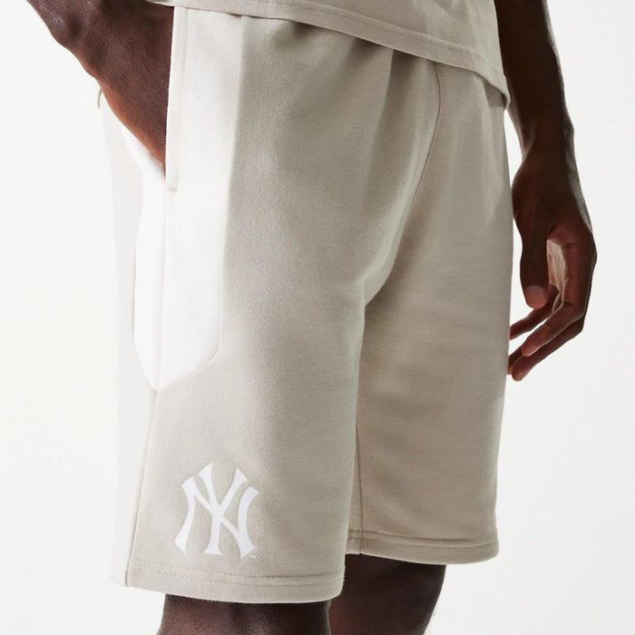 The Male model is wearing New York Yankees MLB Raglan Cream Shorts 3