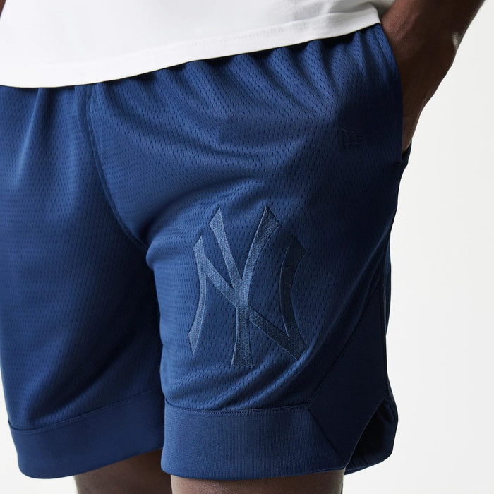 The Male model is wearing New York Yankees Tonal Pack Blue Shorts 5