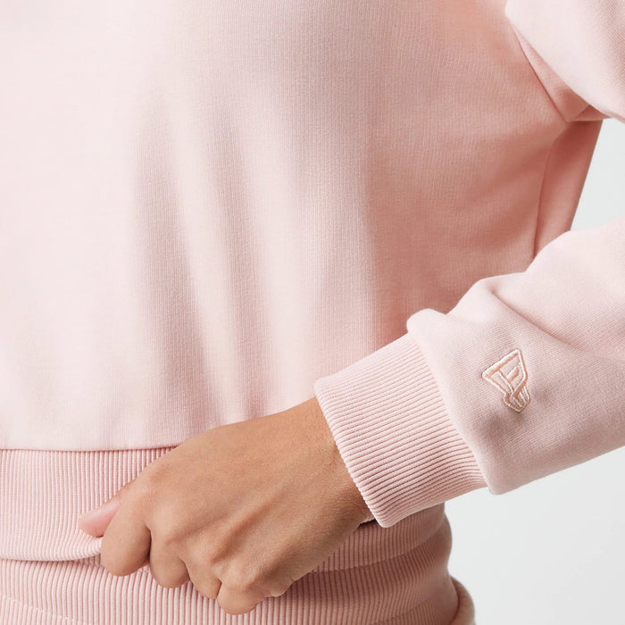 The Female model is wearing New York Yankees Womens MLB Tonal Pastel Pink Cropped 1/4 Zip Sweater 5