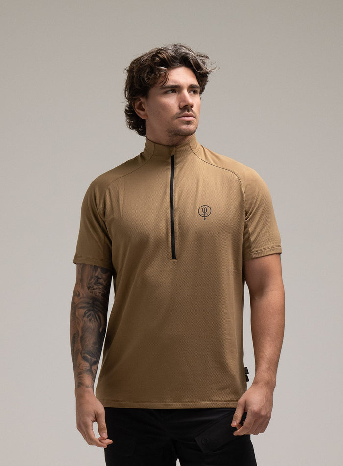 Jack Is 6ft 3" And Wears Size: L | Hem Studio Image Of Model Wearing Oryon Delta T-Shirt In Sand (SS Model)