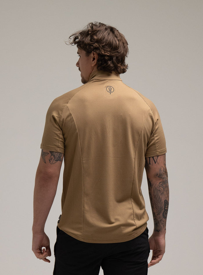 Jack Is 6ft 3" And Wears Size: L | Hem Studio Image Of Model Wearing Oryon Delta T-Shirt In Sand (SS Model)