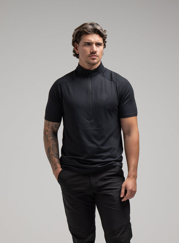 Jack Is 6ft 3" And Wears Size: L | Hem Studio Image Of Model Wearing Oryon Delta T-Shirt In Obsidian Black (SS Model)