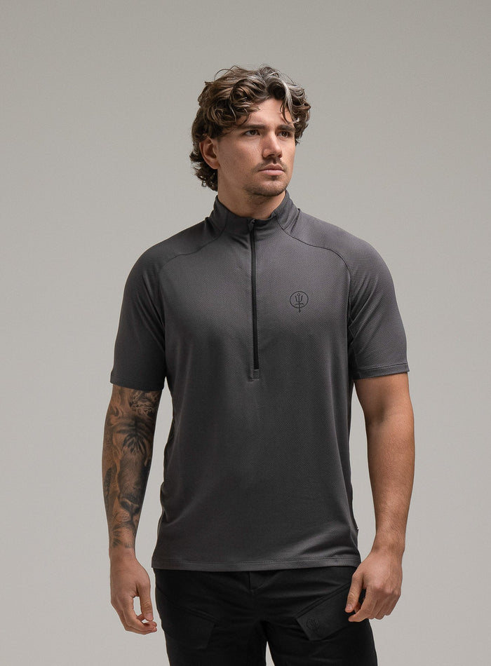 Jack Is 6ft 3" And Wears Size: L | Hem Studio Image Of Model Wearing Oryon Delta T-Shirt In Wolf Grey (SS Model)