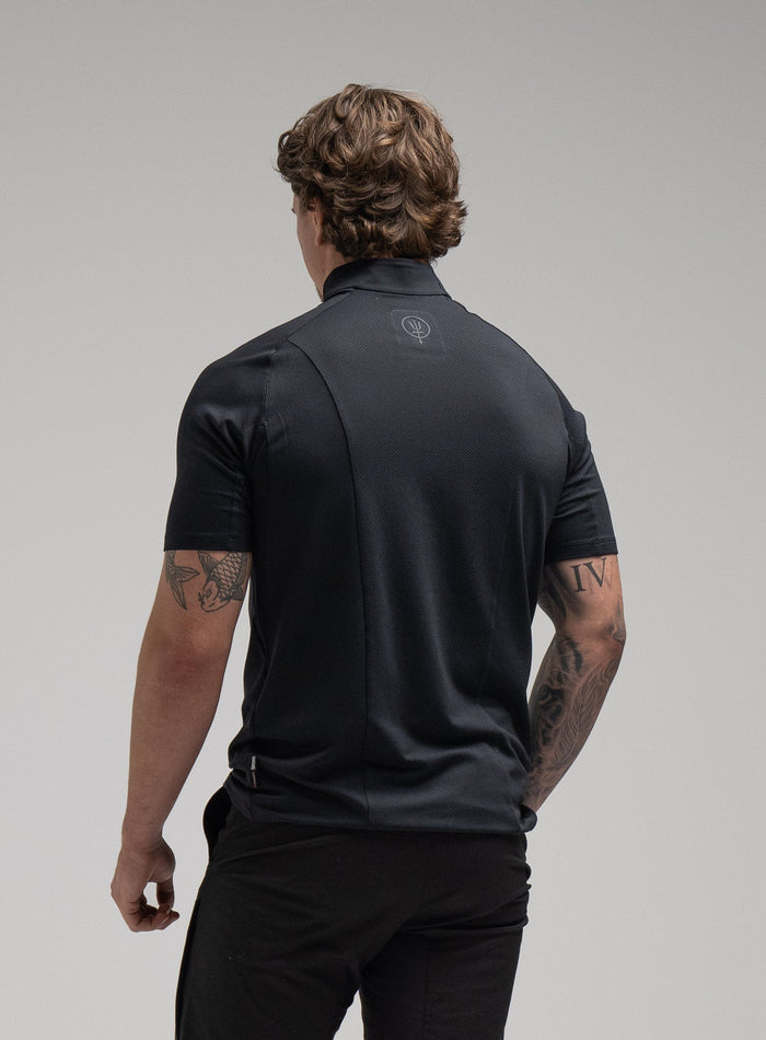Jack Is 6ft 3" And Wears Size: L | Hem Studio Image Of Model Wearing Oryon Delta T-Shirt In Obsidian Black (SS Model)