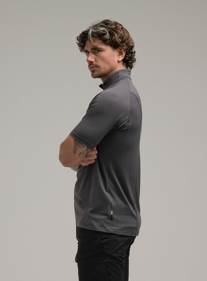 Jack Is 6ft 3" And Wears Size: L | Hem Studio Image Of Model Wearing Oryon Delta T-Shirt In Wolf Grey (SS Model)