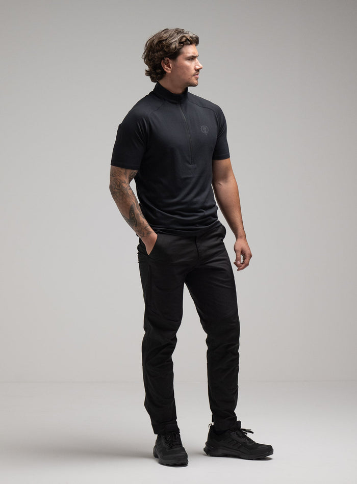 Jack Is 6ft 3" And Wears Size: L | Hem Studio Image Of Model Wearing Oryon Delta T-Shirt In Obsidian Black (SS Model)