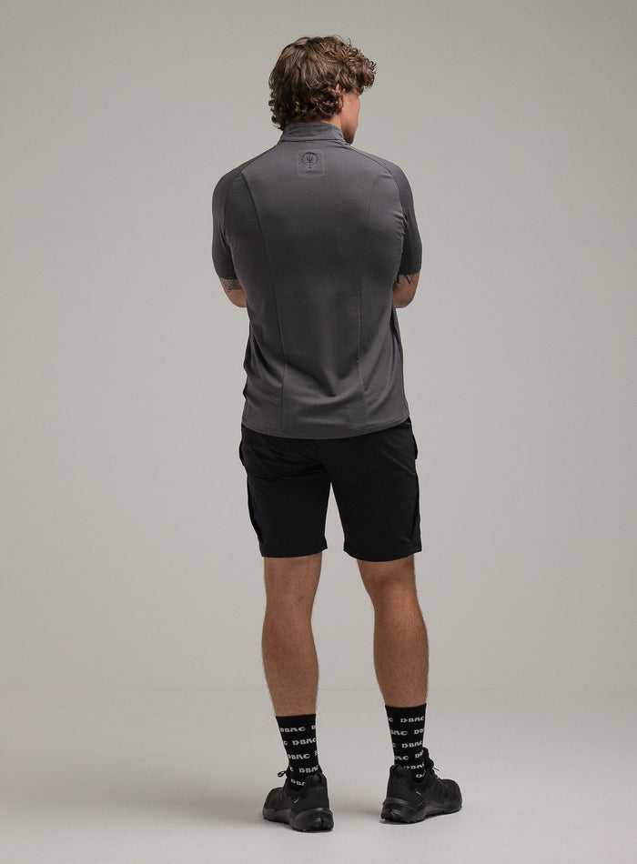 Jack Is 6ft 3" And Wears Size: L | Hem Studio Image Of Model Wearing Oryon Delta T-Shirt In Wolf Grey (SS Model)