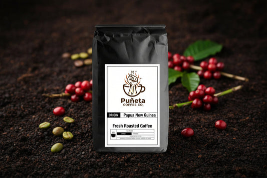 Black coffee bag with Puñeta Coffee Co.