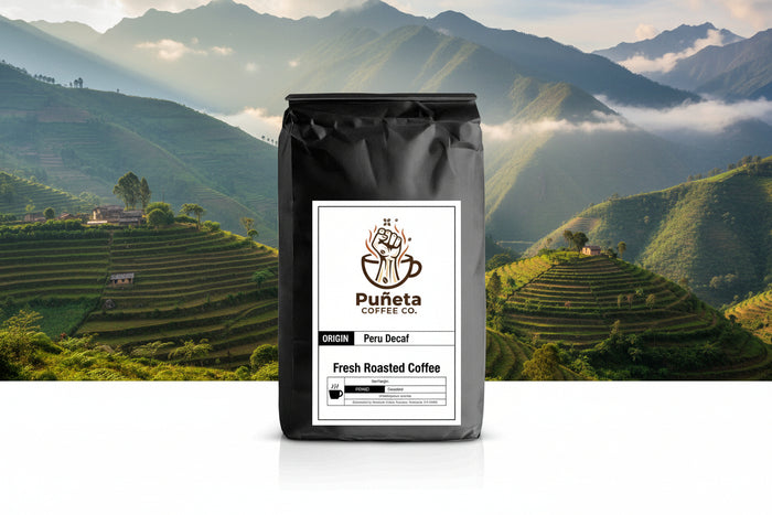 Black coffee bag with Puñeta Coffee Co. label