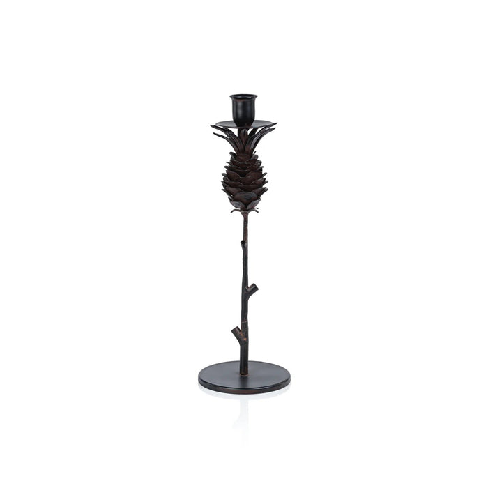 The ZODAX PINECONE WROUGHT IRON CANDLEHOLDER - MEDIUM features a black iron pine cone design atop a slender branch on a round base, measuring 4.5" x 13". Shown against a white background.