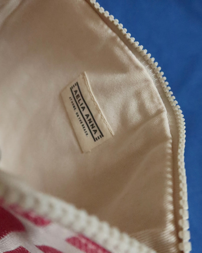 Canvas interior of pink and cream zippered clutch bag Aelia Anna