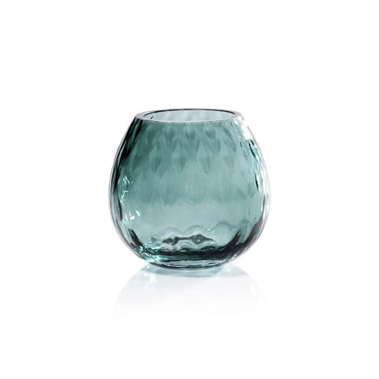 The PRISM Multipurpose Optic Vase Candle Holder in Barberry Green by ZODAX is a round, textured, translucent soda-lime glass vase with a subtle green tint, shown against a white background.