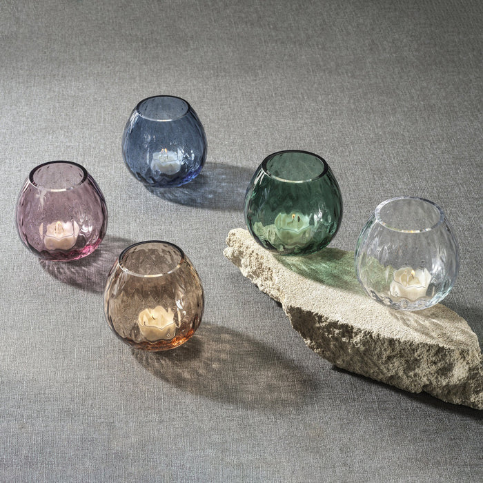 The PRISM Multipurpose Optic Vase Candle Holder in Barberry Green by ZODAX is a round, textured, translucent soda-lime glass vase with a subtle green tint, shown against a white background.
