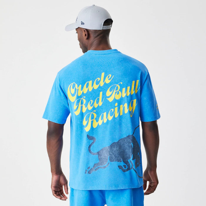 The Male model is wearing Red Bull Racing Back Graphic Blue Oversized T-Shirt 2