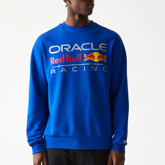 The Male model is wearing Red Bull Racing Blue Oversized Crew Neck Sweater 3