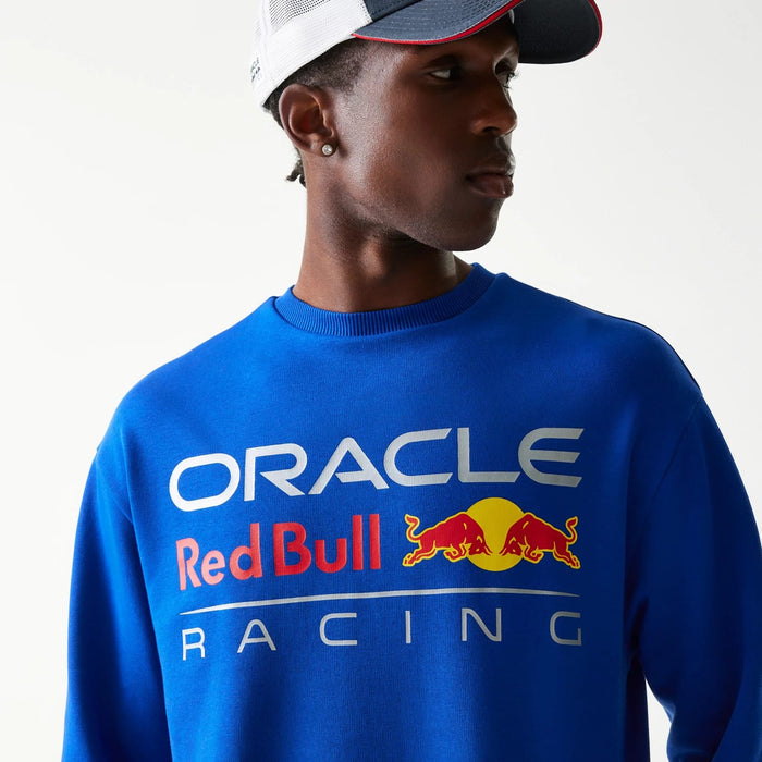 The Male model is wearing Red Bull Racing Blue Oversized Crew Neck Sweater 4
