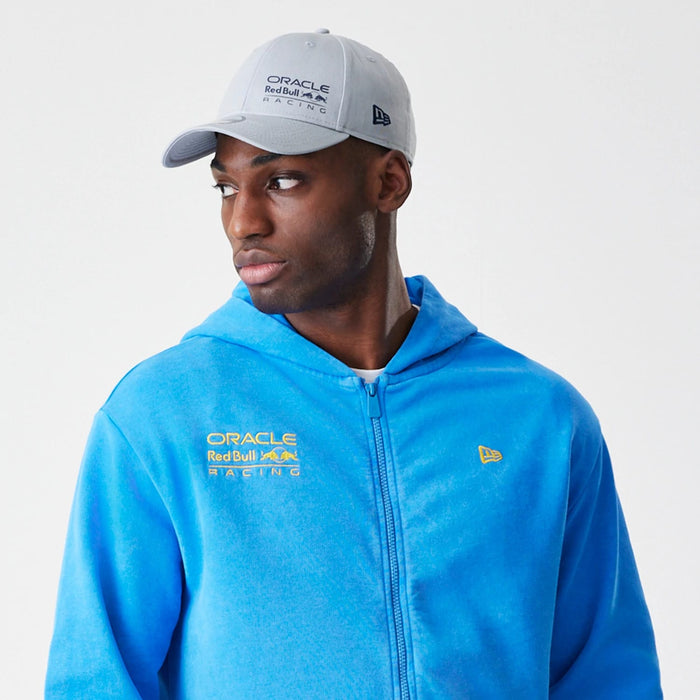 The Male model is wearing Red Bull Racing Blue Oversized Full Zip Hoodie 6