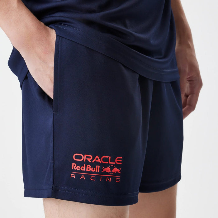 The Male model is wearing Red Bull Racing Graphic Dark Blue Football Shorts 3