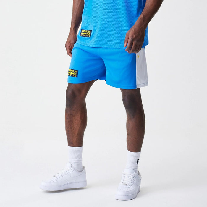The Male model is wearing Red Bull Racing Graphic Mesh Blue Shorts 4