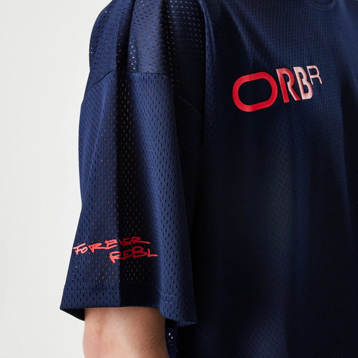 The Male model is wearing Red Bull Racing Graphic Mesh Dark Blue Oversized T-Shirt 3